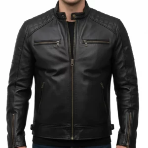 Front view of a man wearing a black quilted style classic biker leather jacket, featuring a stand collar and multiple zippers.
